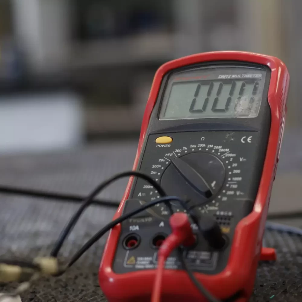 test car battery with multimeter