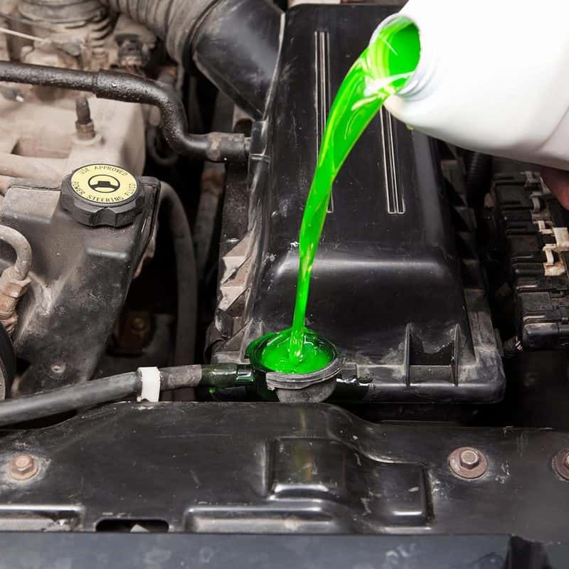 how to put coolant in car