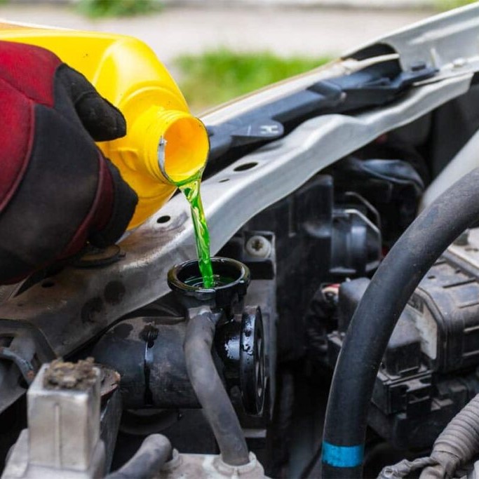 how to put coolant in car