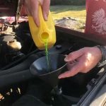 adding coolant to car