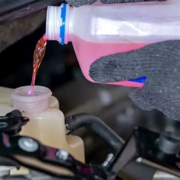 adding coolant to car