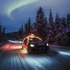 car covered in christmas lights