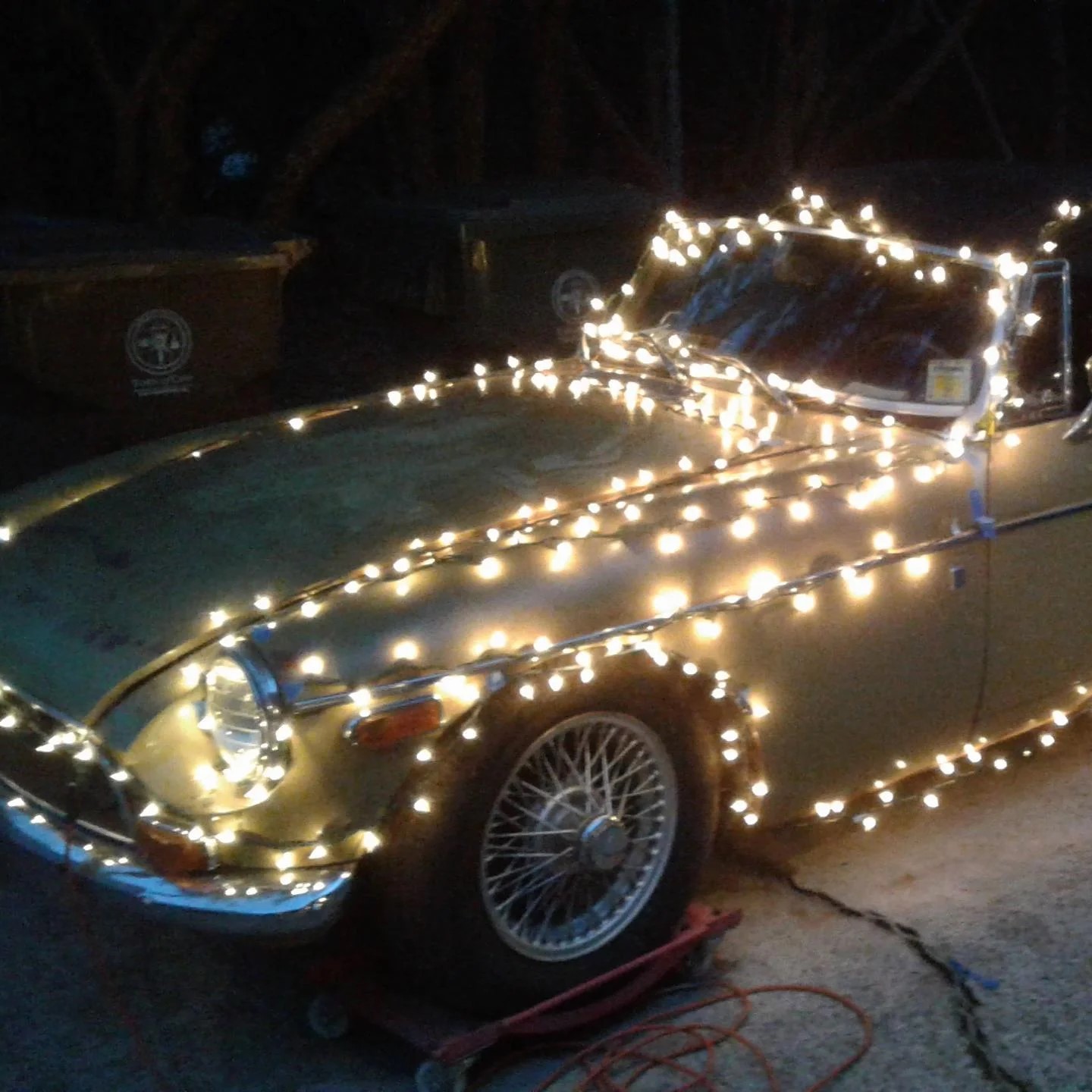 car covered in christmas lights