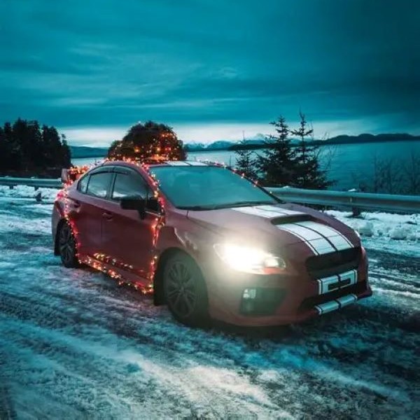 car covered in christmas lights