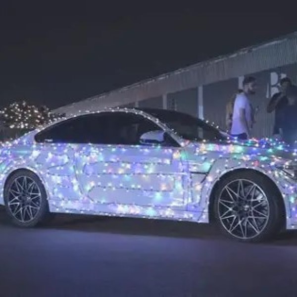 car wrapped in christmas lights